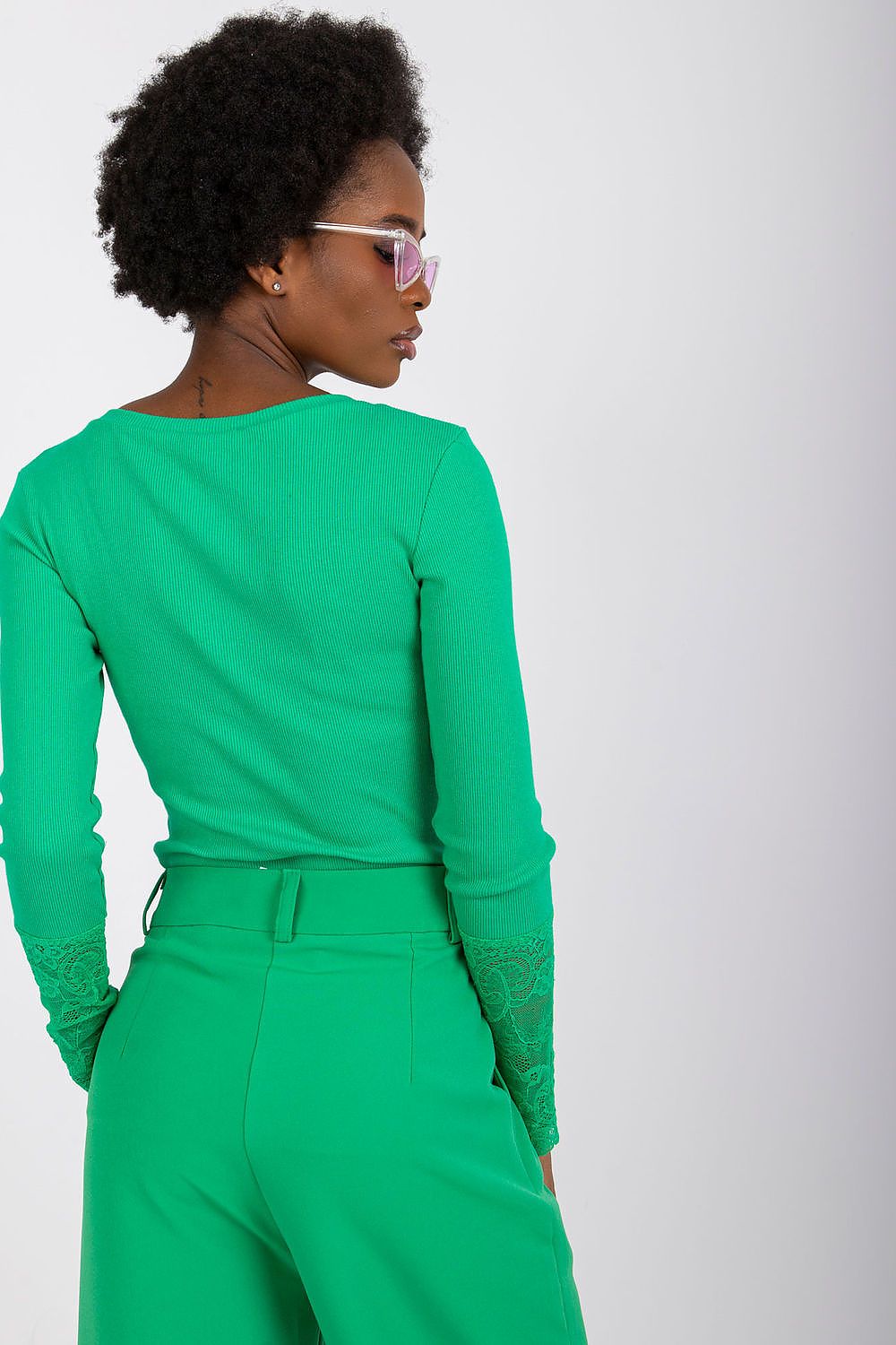 Chic ribbed blouse with exquisite lace trim by Rue Paris, a perfect addition to any fashionable wardrobe.
