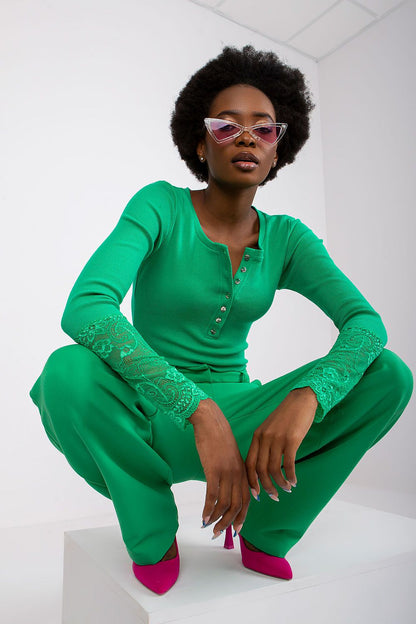 Elegant ribbed blouse with lace detail by Rue Paris, showcasing a sophisticated design perfect for casual to chic styles.