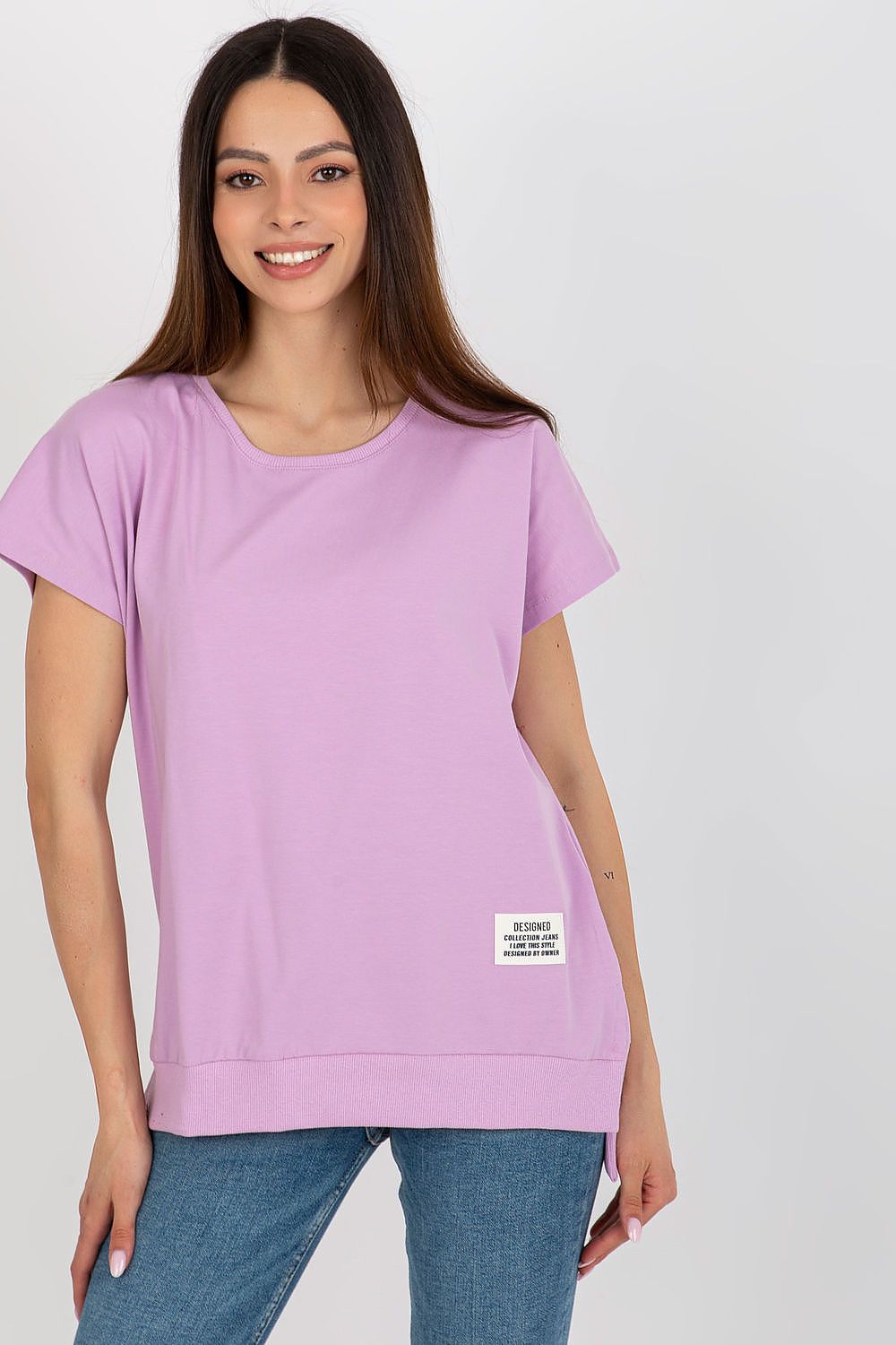 Luxury women's loose fit blouse with short sleeves, decorative patch, crafted from a cotton and spandex blend by Relevance.