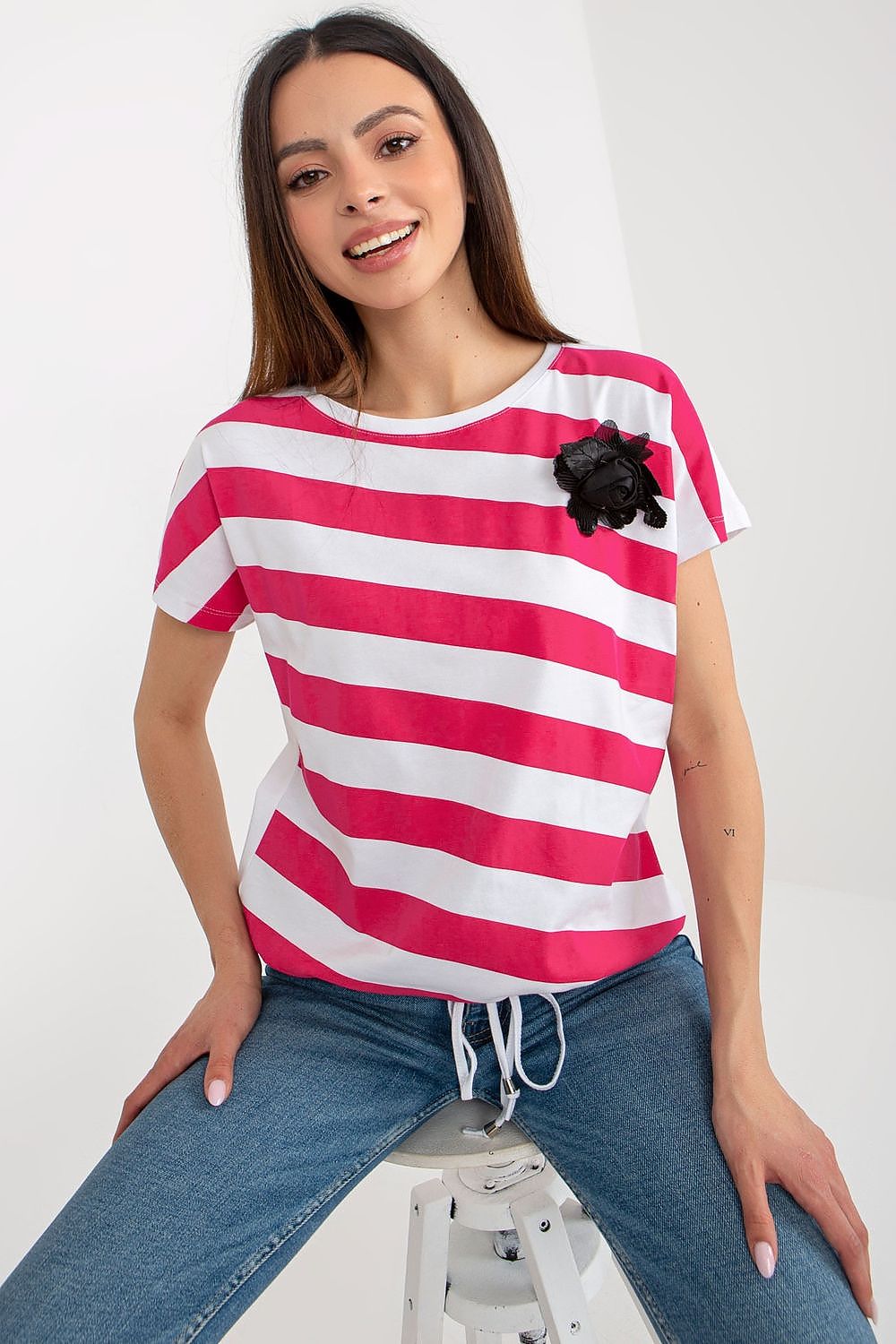 Relevance elegant women's blouse with colourful stripes and flower embellishment, perfect for stylish occasions.