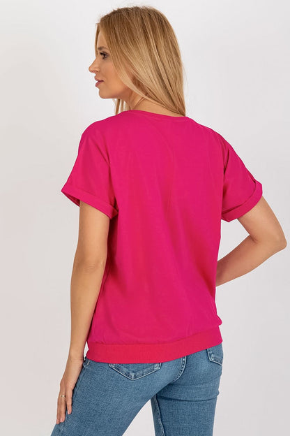 Stylish close-up of a decorative patch on the elegant short sleeve blouse, crafted from cotton blend, embodying sophistication by Relevance.