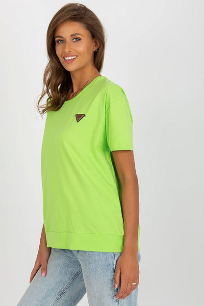 Sophisticated close-up of the decorative patch on the Elegant Women's Short Sleeve Blouse by Relevance, showcasing fine detailing and premium materials.