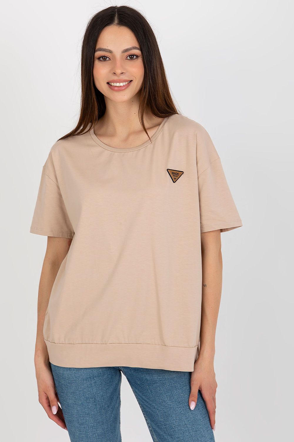 Stylish women's blouse with short sleeves and a unique decorative patch, designed by Relevance, highlighting premium 90% cotton fabric.