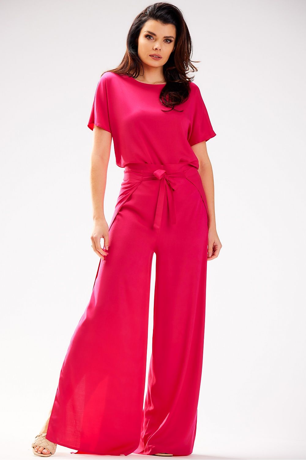 Elegant Grecian tiered high-waisted trousers for women by Awama, crafted from airy viscose in a luxurious design, made in Poland.
