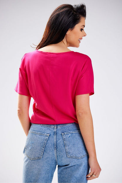 Awama's exquisite viscose blouse, ideal for summer, featuring a simple cut and airy fabric for a luxurious feel.