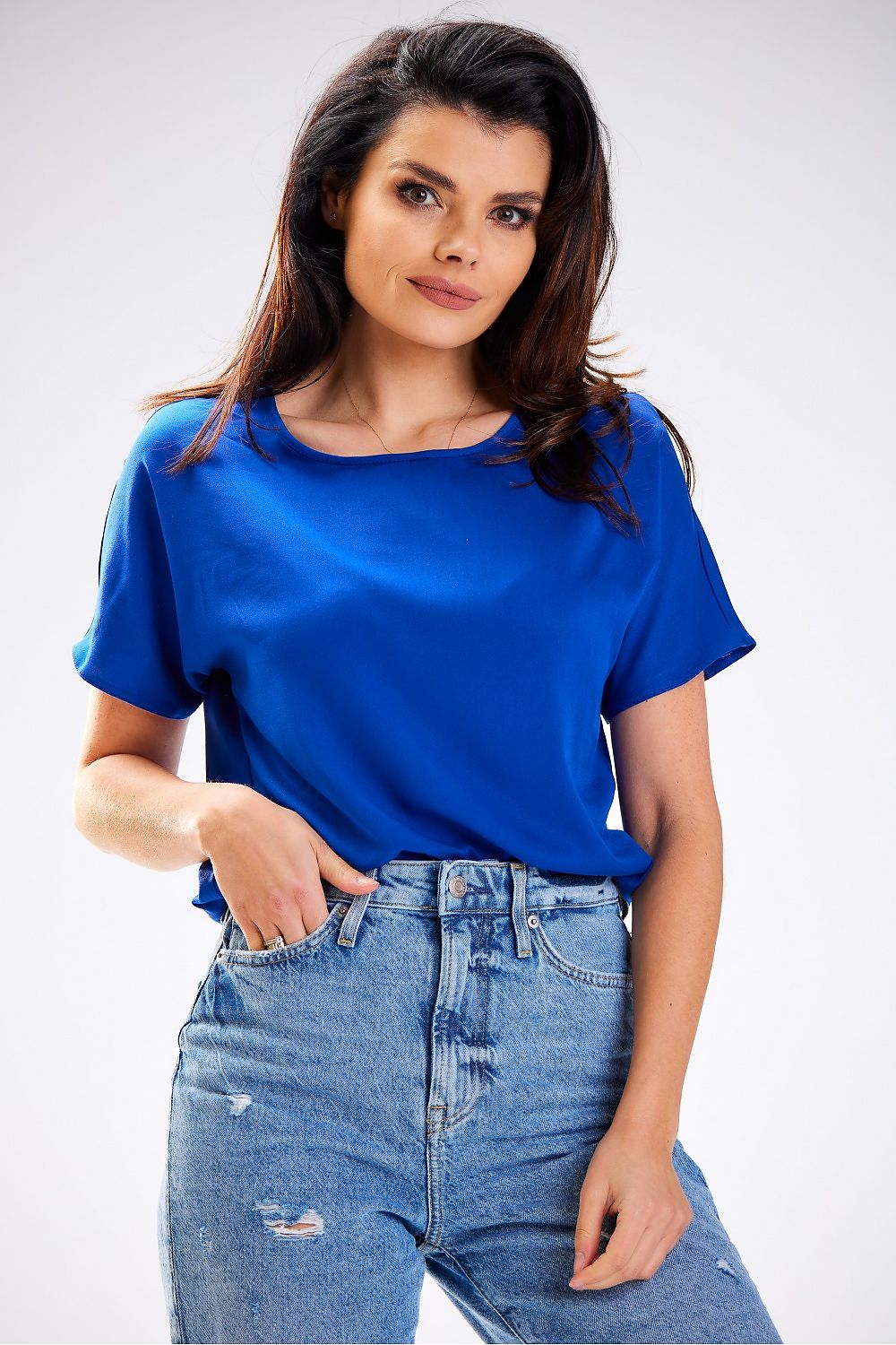 Chic and comfortable viscose blouse by Awama, masterfully tailored in Poland, perfect for warm summer days.