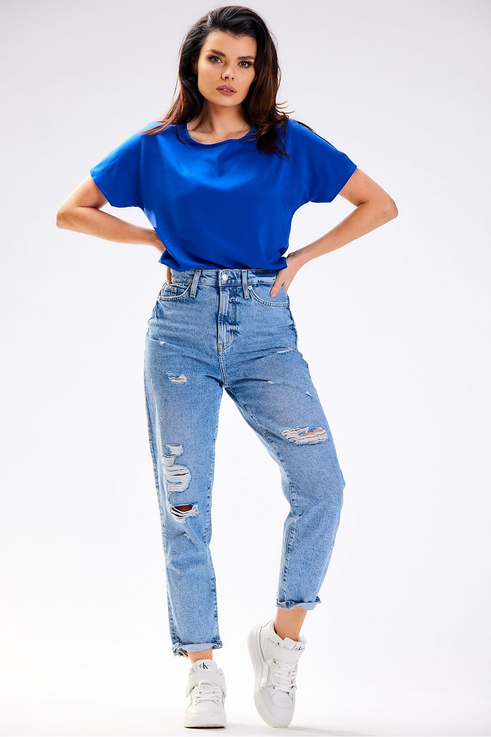 Elegant summer blouse by Awama, crafted from soft viscose, highlighting a luxurious and breathable design.