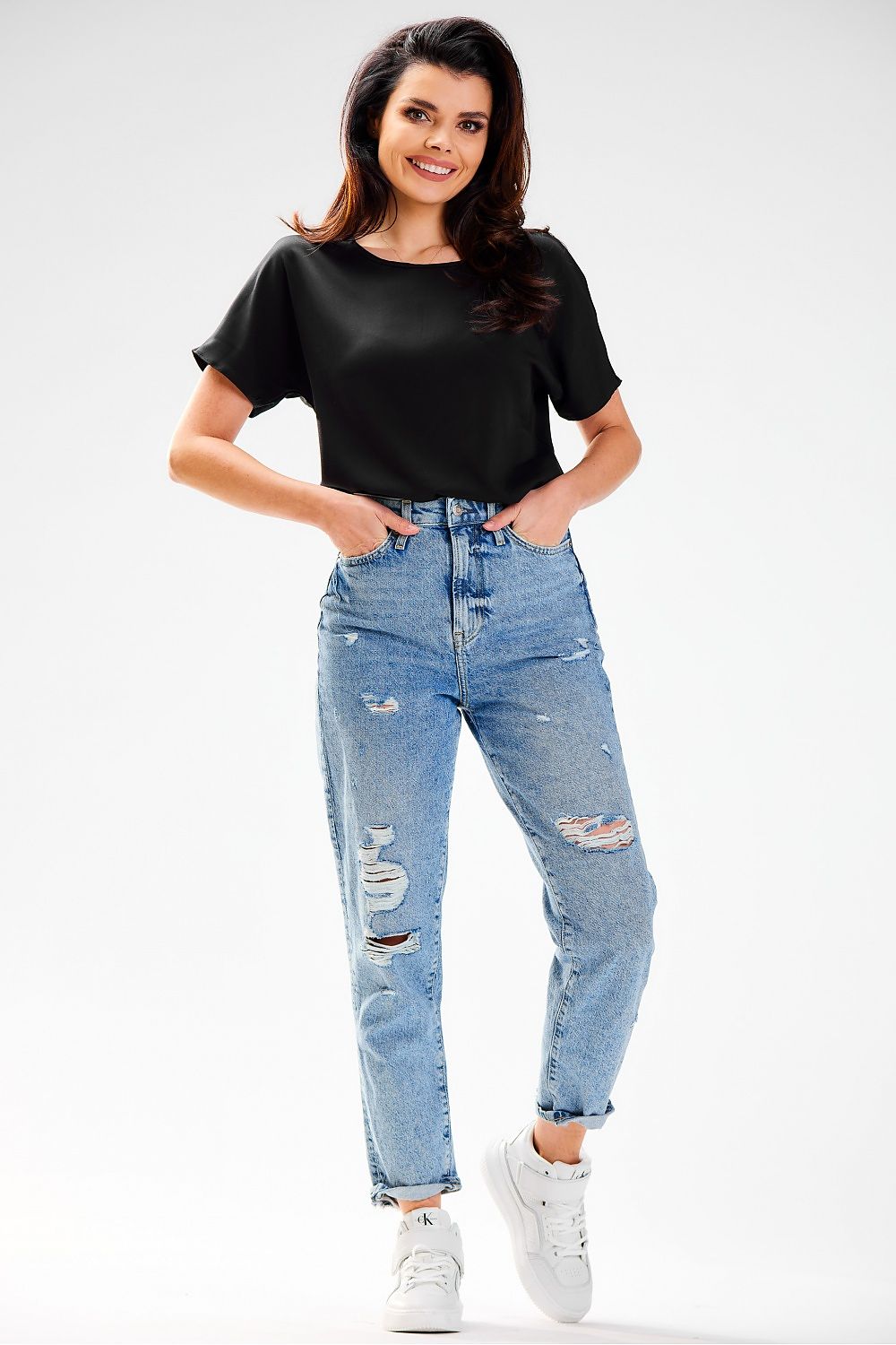 Close-up of the fine detail and soft texture of the Elegant Viscose Blouse by Awama, crafted for comfort.