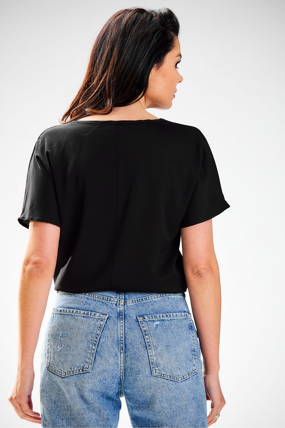 Elegant Viscose Blouse by Awama displayed on a mannequin, highlighting its perfect fit and airy silhouette.