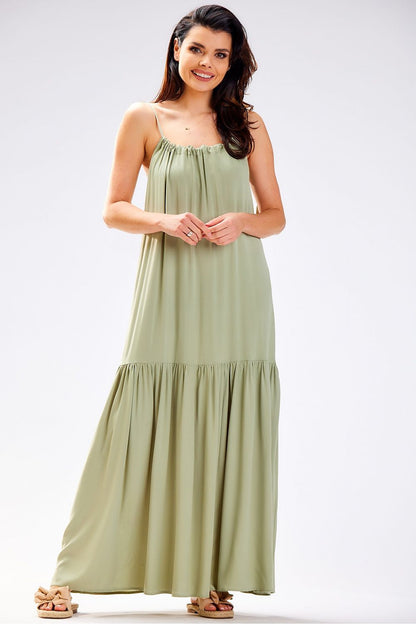 Elegant oversized summer daydress by Awama featuring a loose cut and ruffle hem, crafted from airy viscose fabric.
