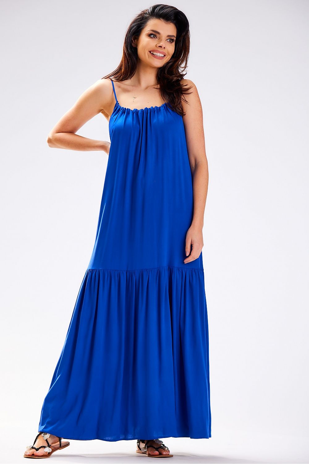 Chic oversized dress by Awama, perfect for summer days, highlighted by its airy fabric and elegant back neckline.