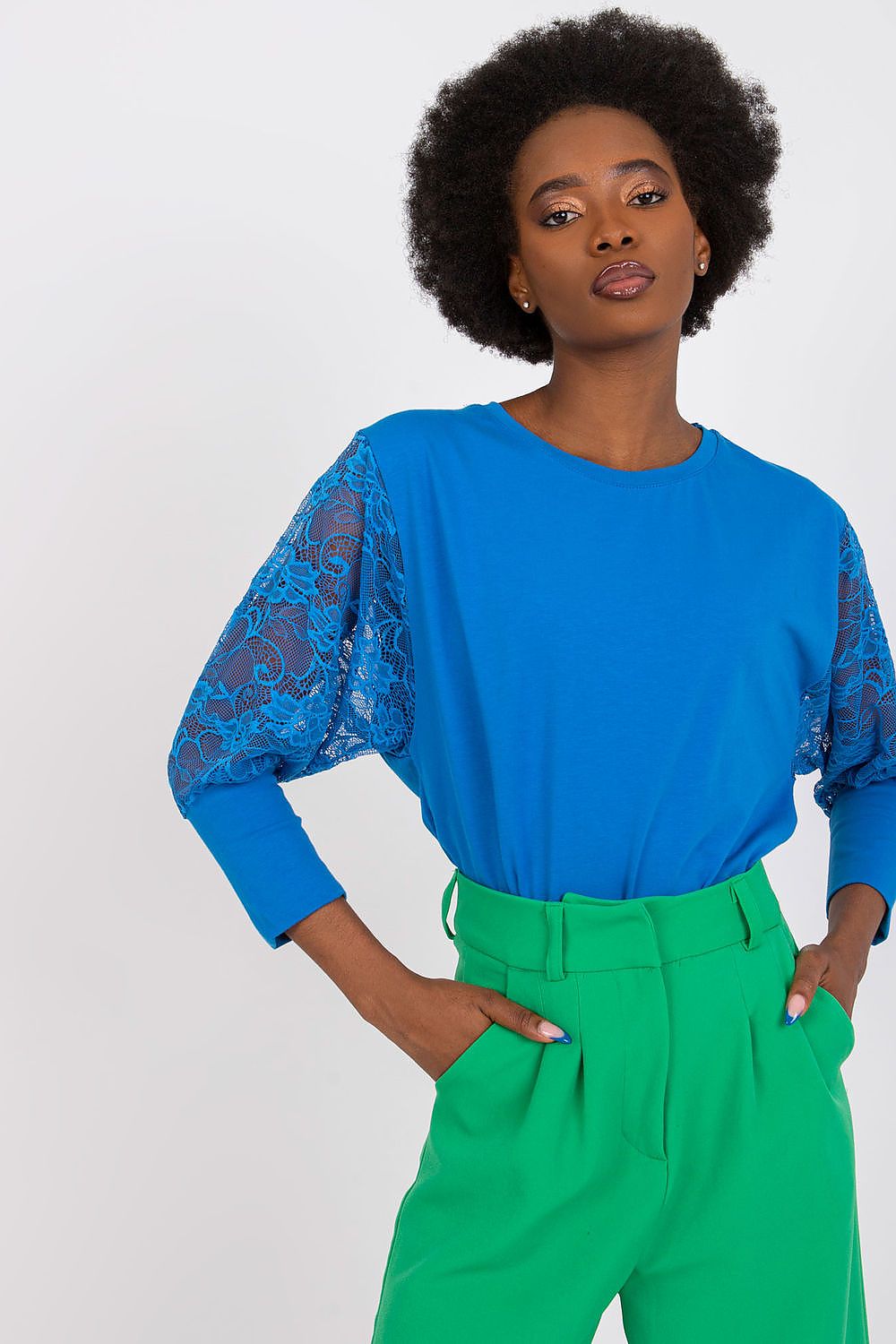 Stylish Rue Paris blouse with intricate lace detailing on 3/4 sleeves, perfect for sophisticated occasions.