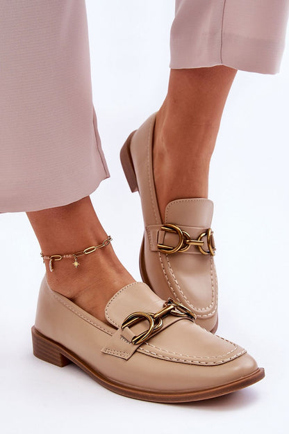 Chic women's slip-on moccasins from Step in Style made of eco-friendly leather with a decorative strap for a sophisticated look.