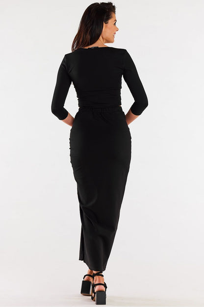 Chic and elegant maxi skirt by Infinite You, featuring a subtle slit and high-quality soft knit fabric for an exquisite look.