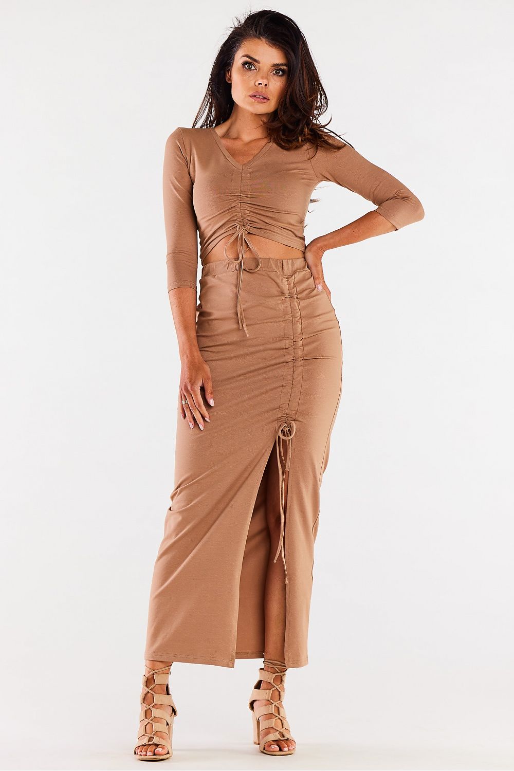 Sophisticated model wearing Infinite You elegant maxi skirt with slit, highlighting its flattering design and premium fabric.
