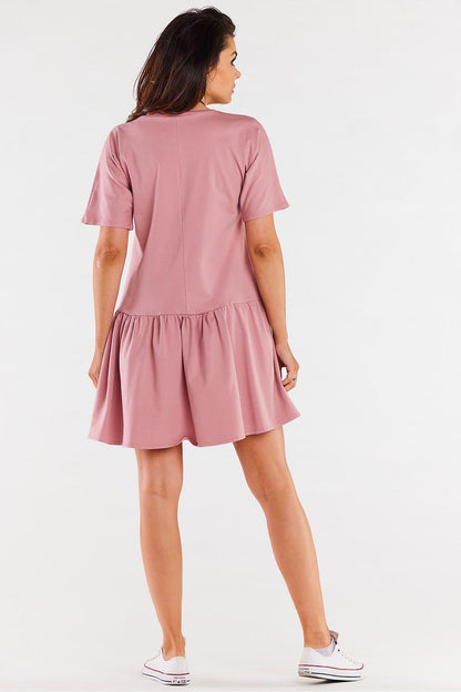 Model wearing the Infinite You Cotton Ruffle Daydress, demonstrating its versatile style combined with summer sandals for an elegant summer look.