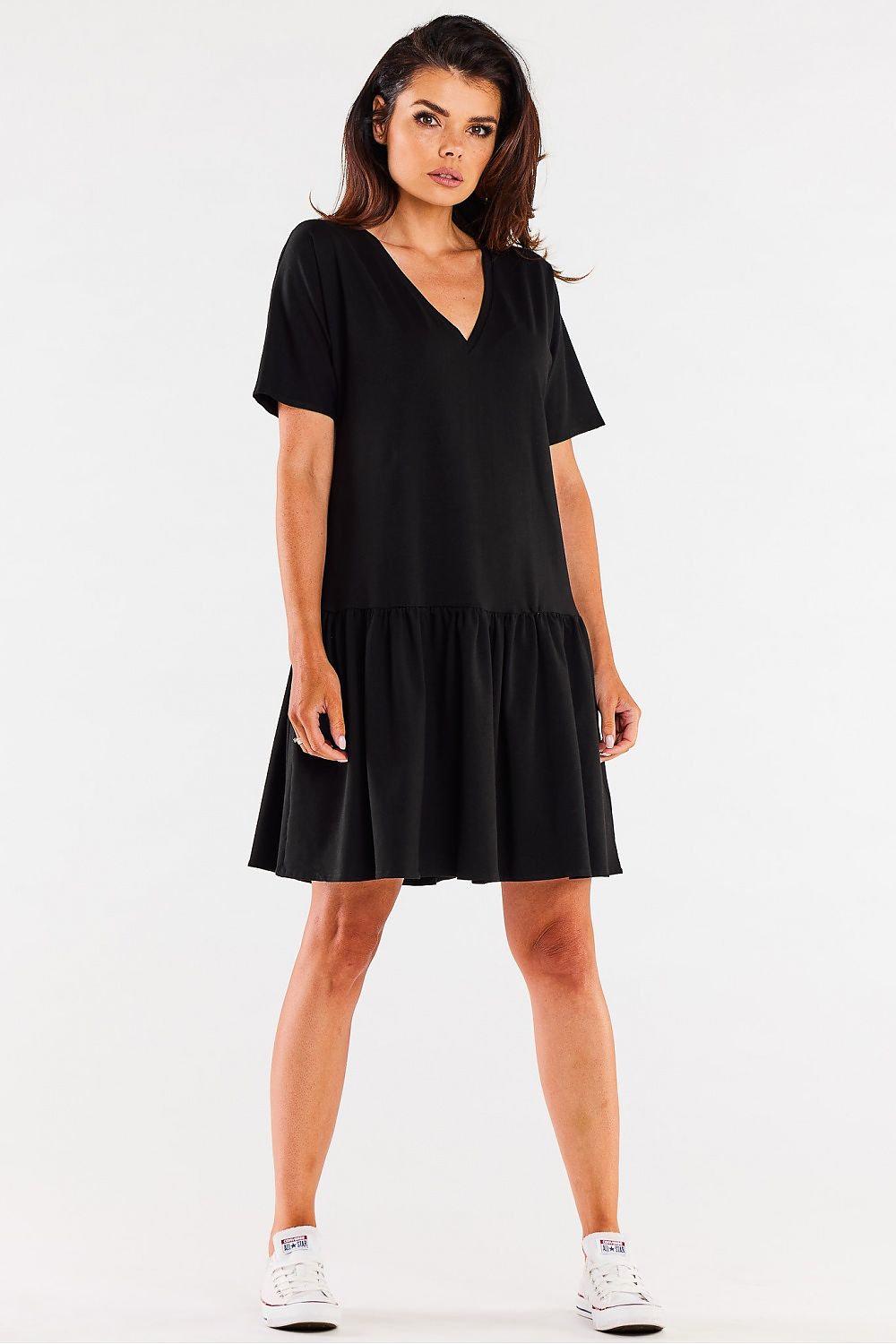 The Infinite You Cotton Ruffle Daydress displayed on a mannequin, emphasizing its comfortable silhouette and soft cotton fabric ideal for warm weather.