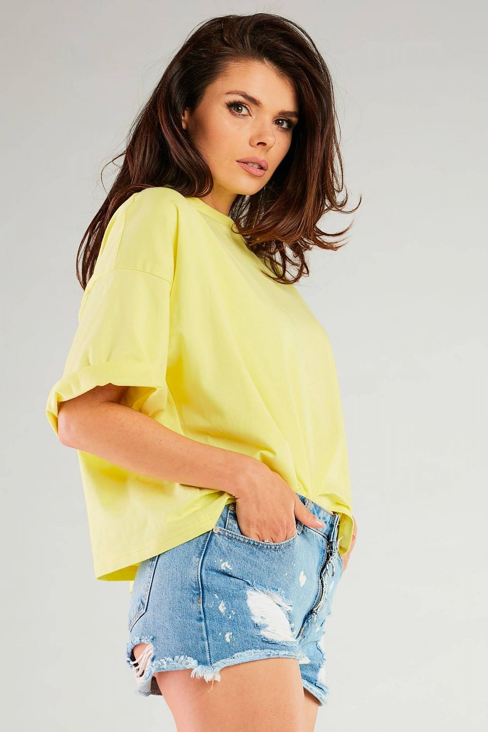 Elegant yellow loose blouse with wide sleeves by Infinite You, showcasing a perfect blend of comfort and style.