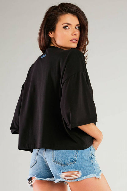 Elegant loose blouse in vibrant yellow from Infinite You, designed with wide sleeves for a luxurious silhouette.