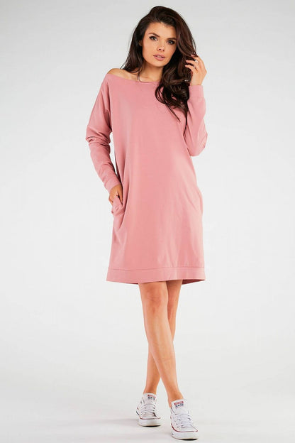 Close-up view of the chic design elements of the Infinite You daydress, featuring a sophisticated silhouette made from soft materials.