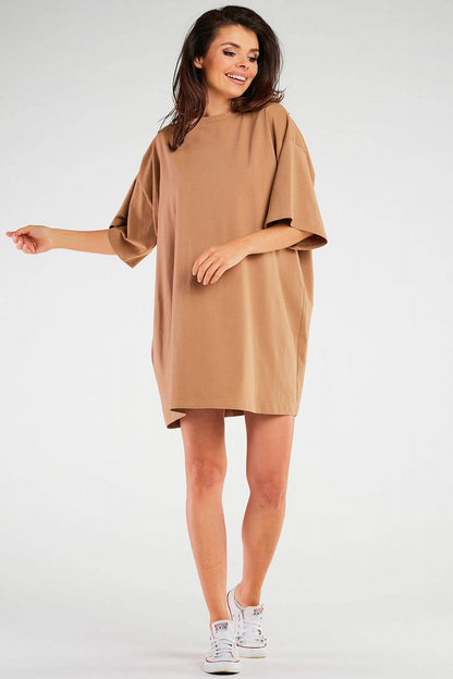 Model wearing the Infinite You Elegant Polish Daydress, demonstrating its flattering fit and elegant style.