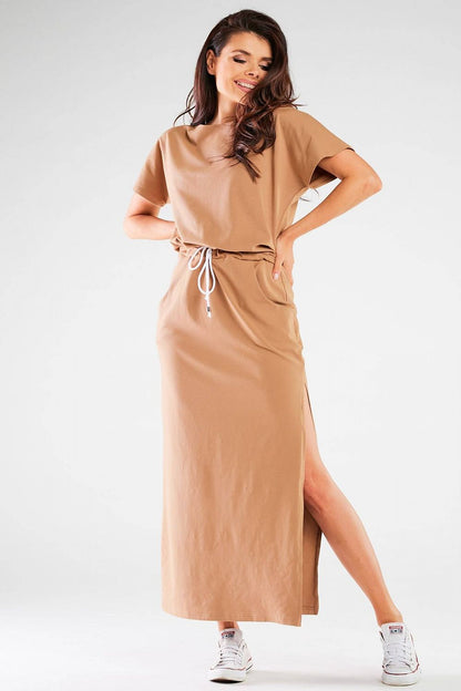 Model wearing the Infinite You elegant summer dress, elegantly styled for spring-summer fashion, featuring short sleeves and a flattering silhouette.