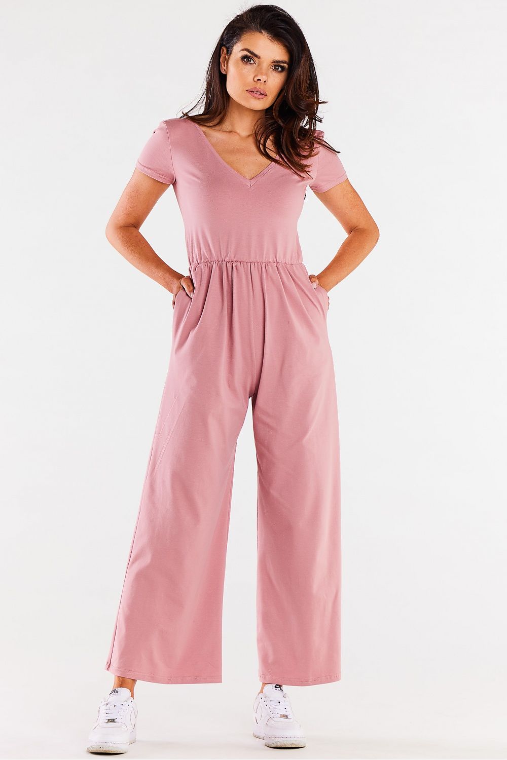 Elegant wide-legged jumpsuit by Infinite You featuring a soft knit fabric and a heart neckline, perfect for upscale occasions.
