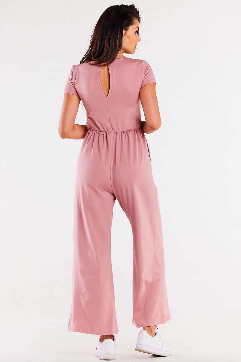 A model wearing the Infinite You elegant wide-legged jumpsuit, portraying sophistication and comfort at a fashion event.