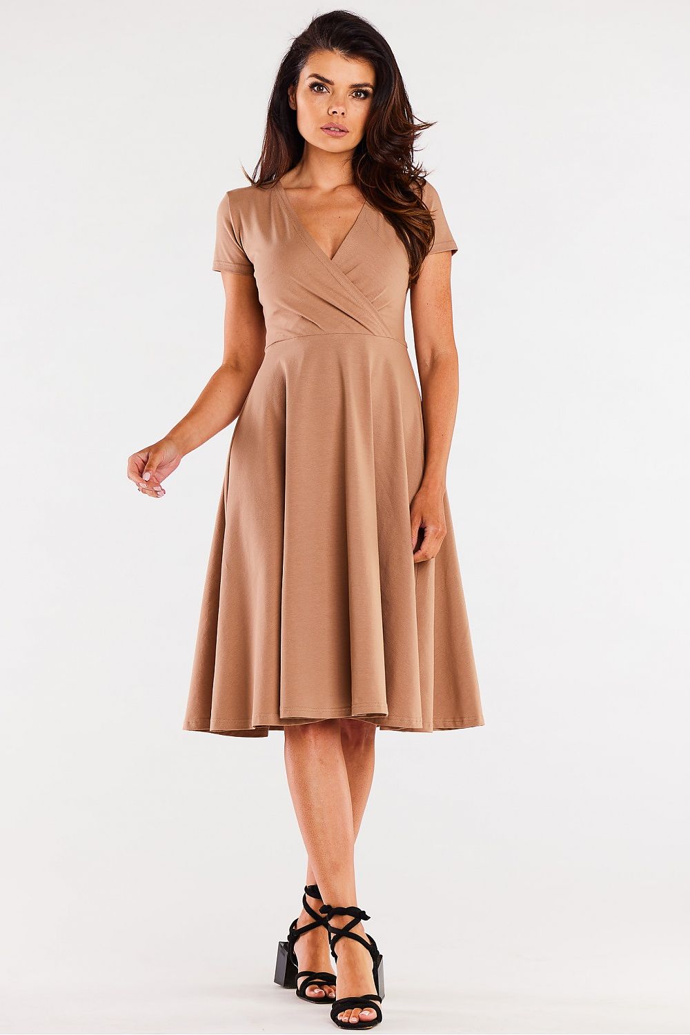 Side view of the Elegant Midi Dress with short sleeves by Infinite You, illustrating the flattering design that enhances feminine curves.