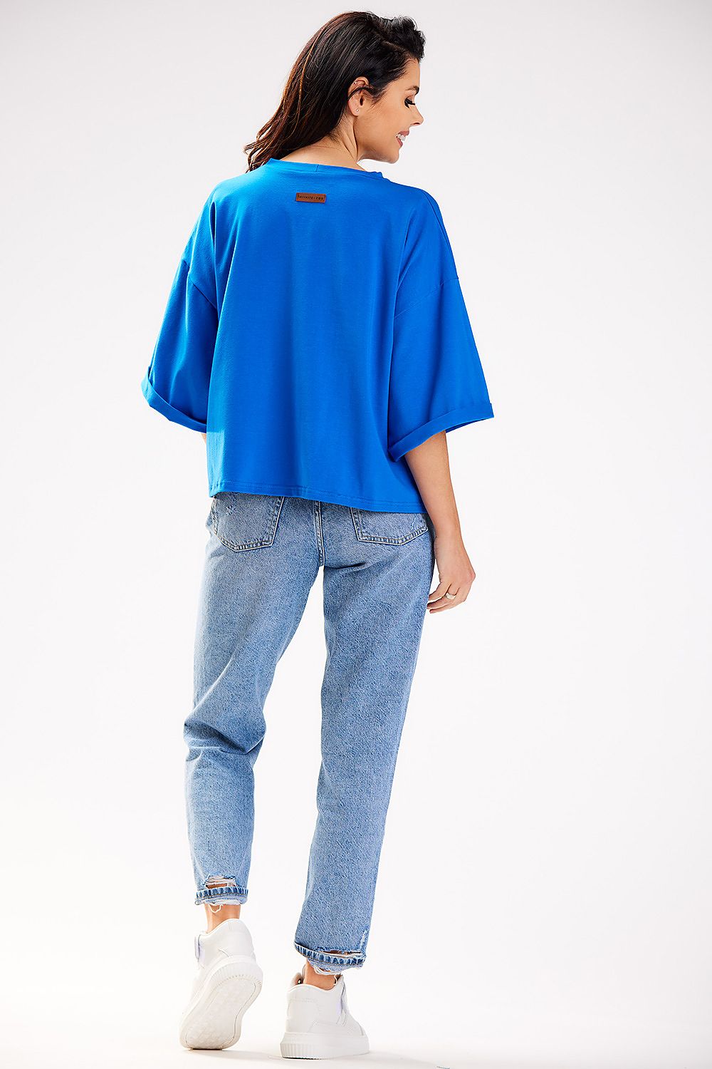 Luxurious loose blouse with wide sleeves by Infinite You, shown in elegant white.