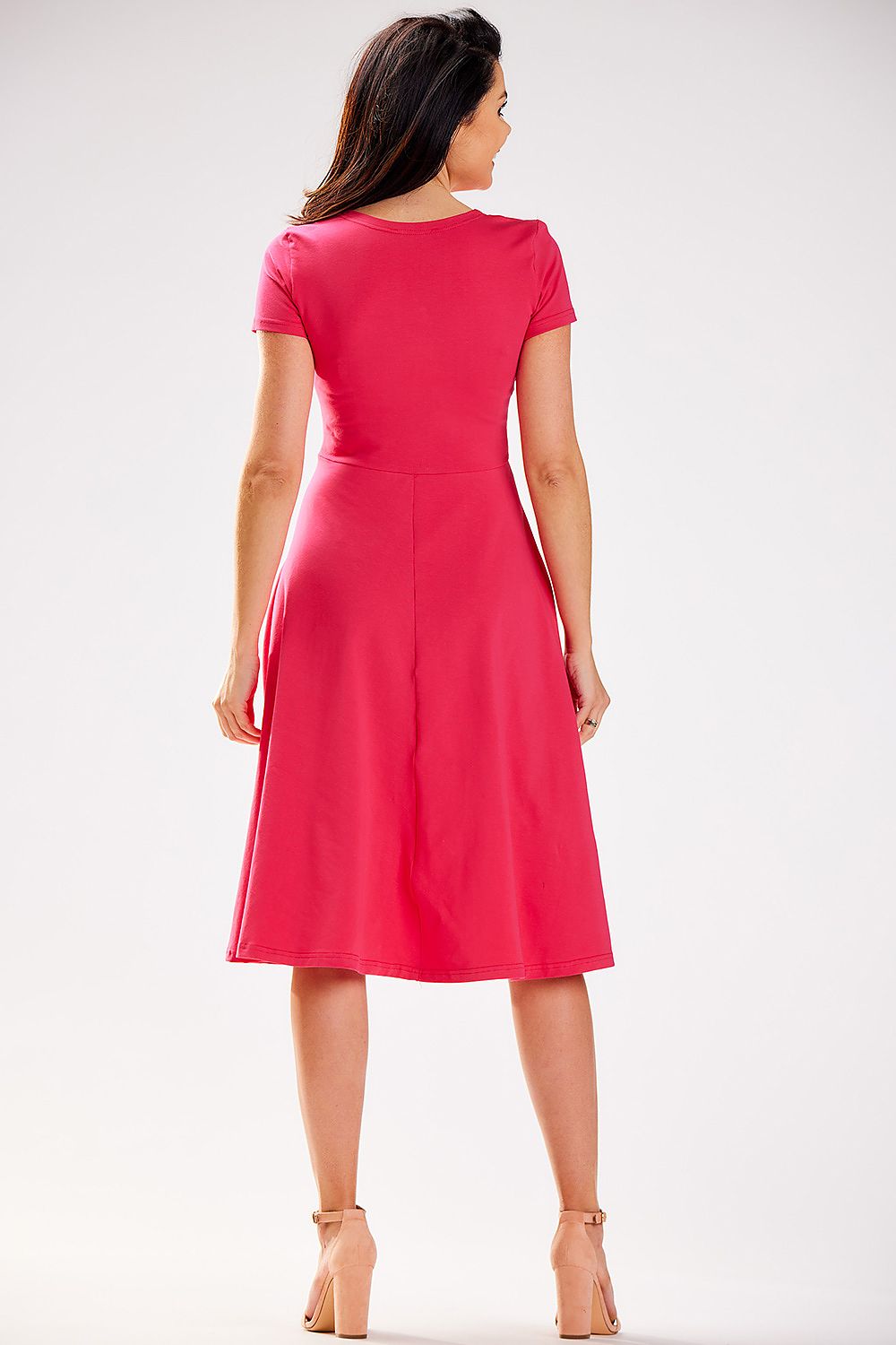 Stylish model wearing Infinite You's envelope neckline midi dress, highlighting the dress's elegant design and perfect tailoring.