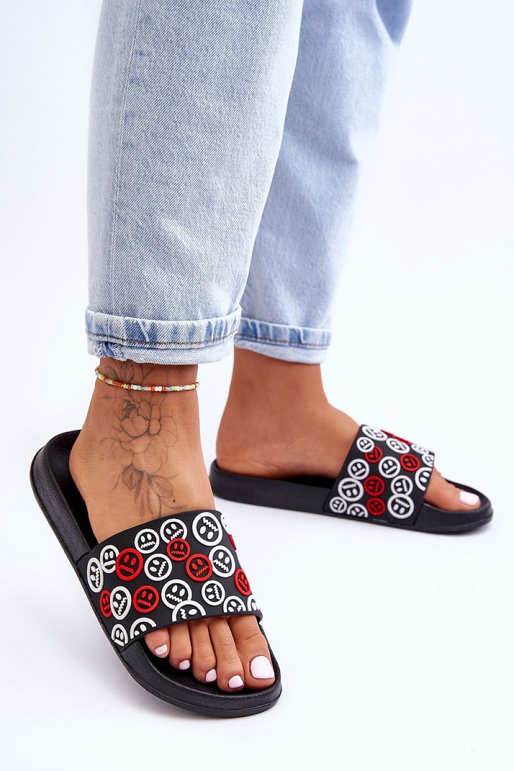 Stylish platform flip-flops for women by Step in Style, showcasing trendy emoticon straps and a plush foam comfort insole, ideal for summer outings.
