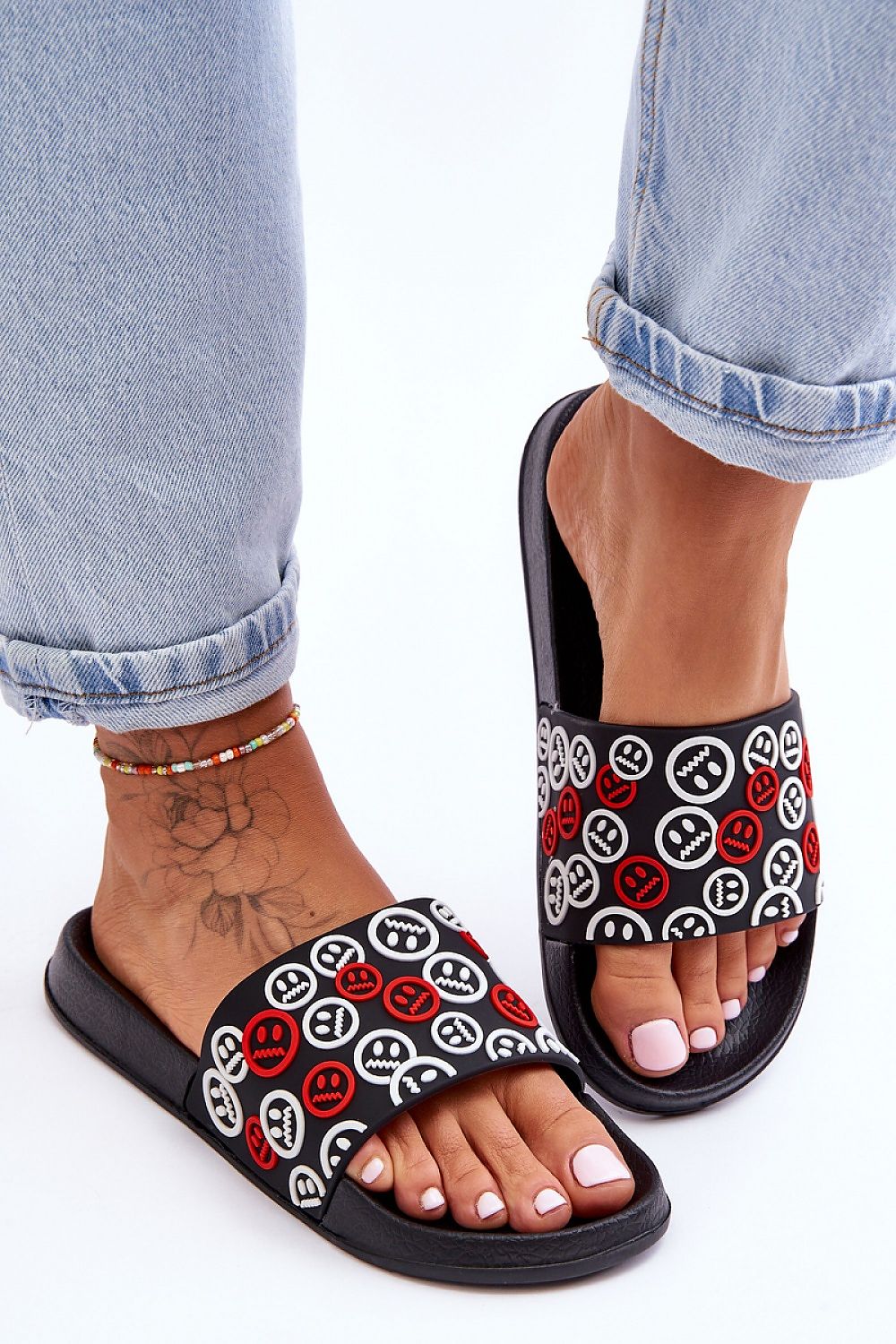 Elegant women's flip-flops with emoticon detailing, designed by Step in Style, designed for ultimate comfort with foam insoles and a fashionable platform.
