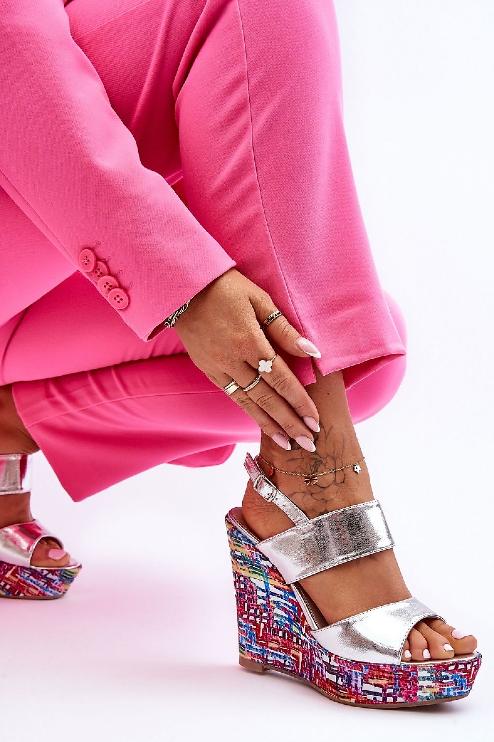 Fashionable pose featuring luxury women's eco leather high heel sandals with adjustable strap by Step in Style, highlighting the intricate platform design and chic styling.