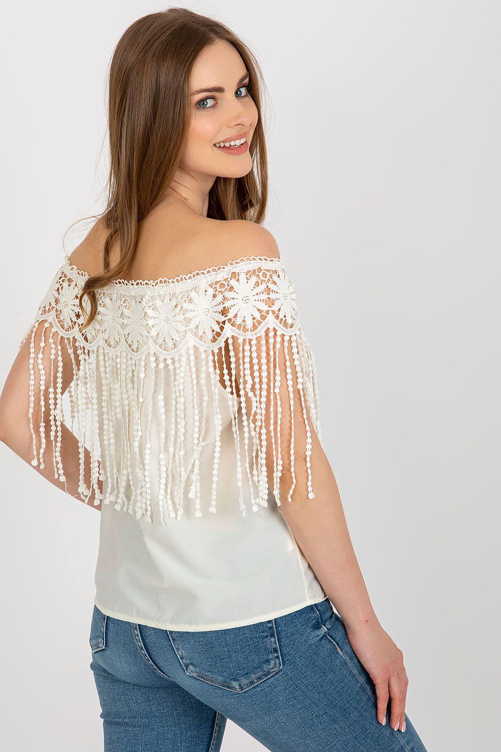 Close-up view of the decorative lace and tassels on the AT summer blouse, highlighting the exquisite craftsmanship.