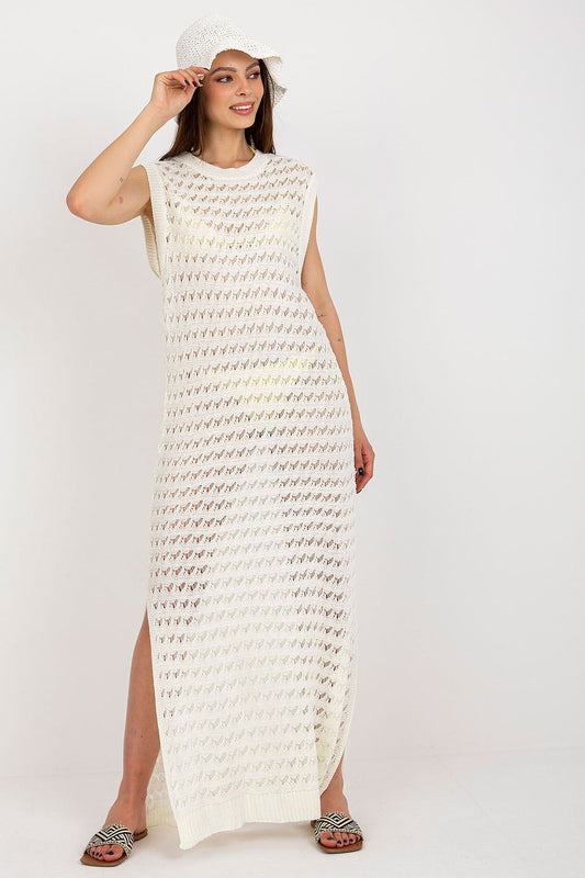 Luxury Openwork Long Knit Beach Dress by Badu featuring decorative side slits, ideal for beach outings and elegant summer occasions.