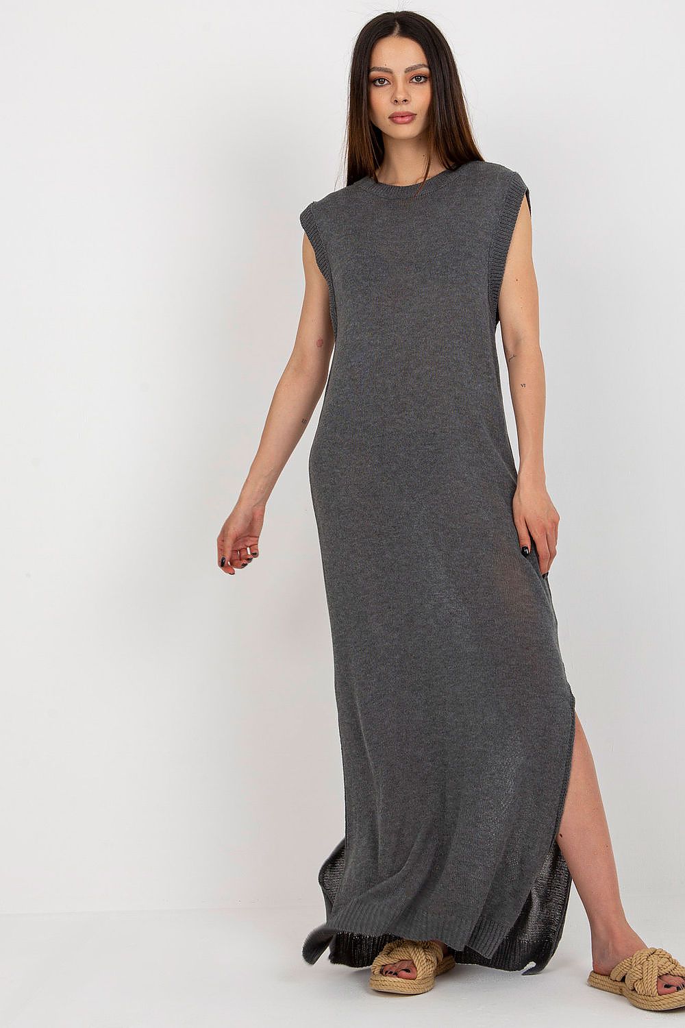Luxury long knit beach dress by Badu featuring decorative side slits, perfect for summer elegance.