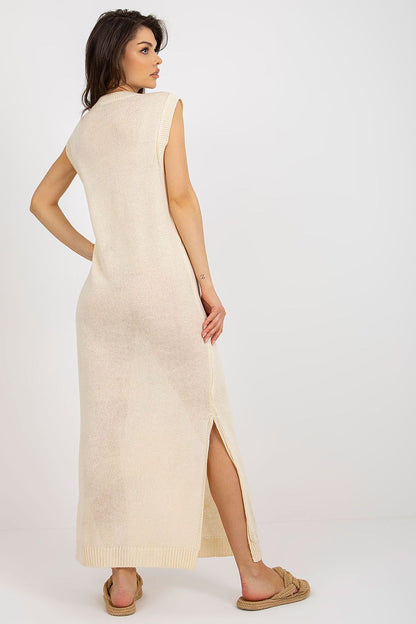 Badu luxury long knit beach dress highlighting decorative side slits, an ideal choice for summer style.