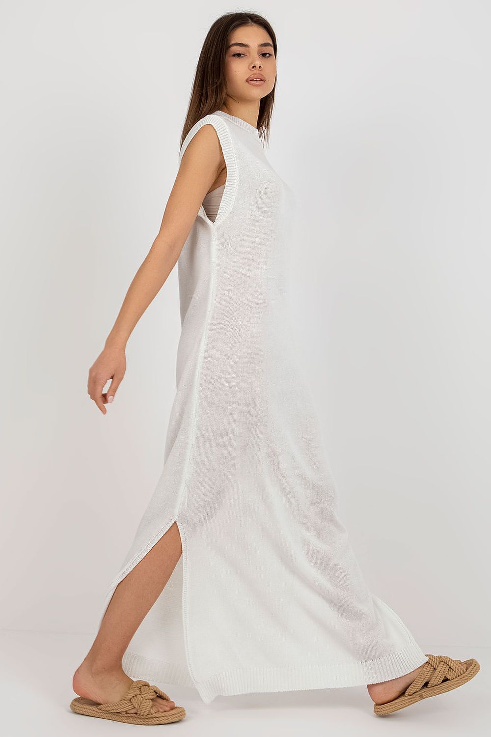 Luxury long knit beach dress with decorative side slits by Badu, perfect for summer elegance.