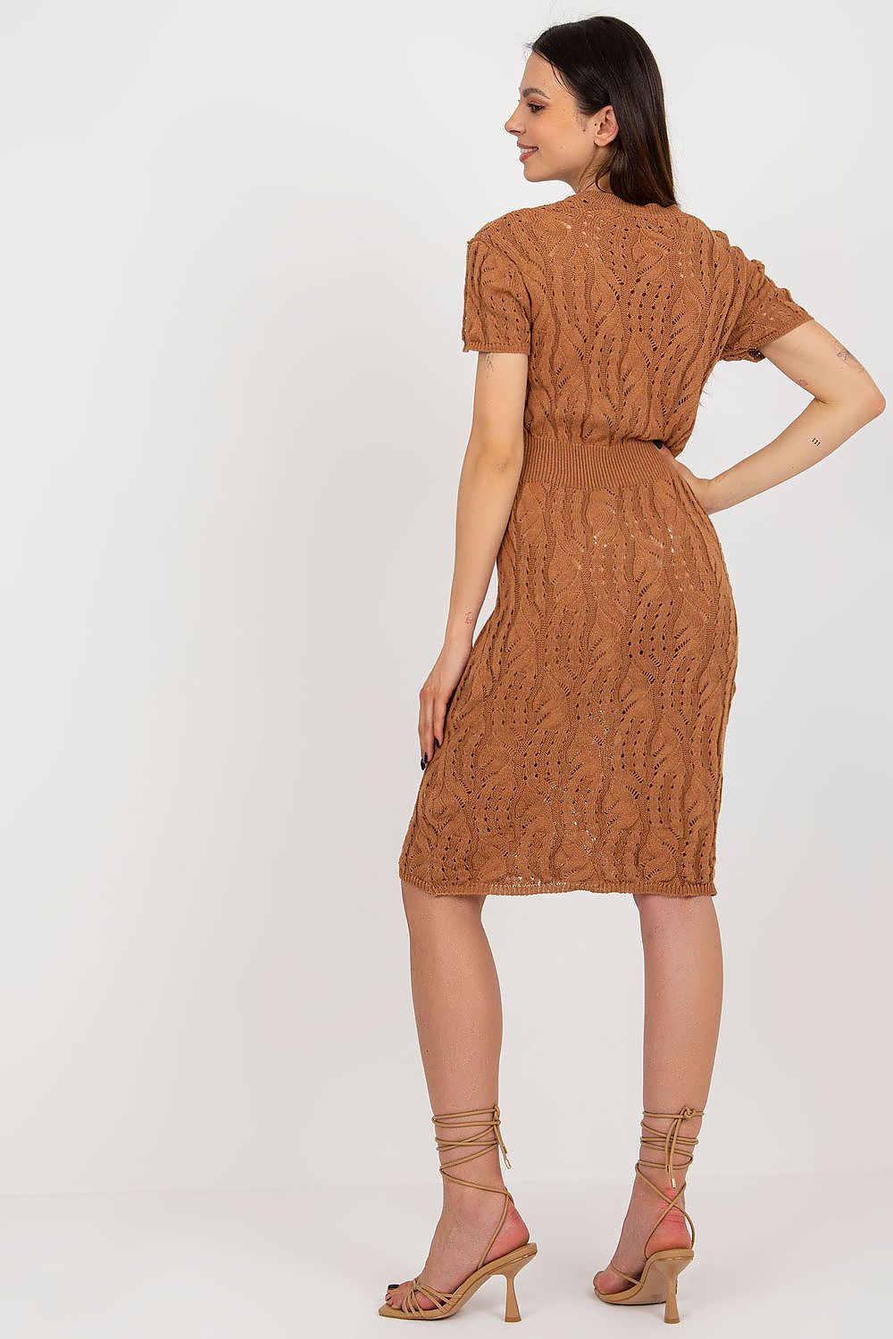 Gorgeous Badu knitted pencil dress with a romantic heart neckline, ideal for modern fashion lovers seeking elegance.