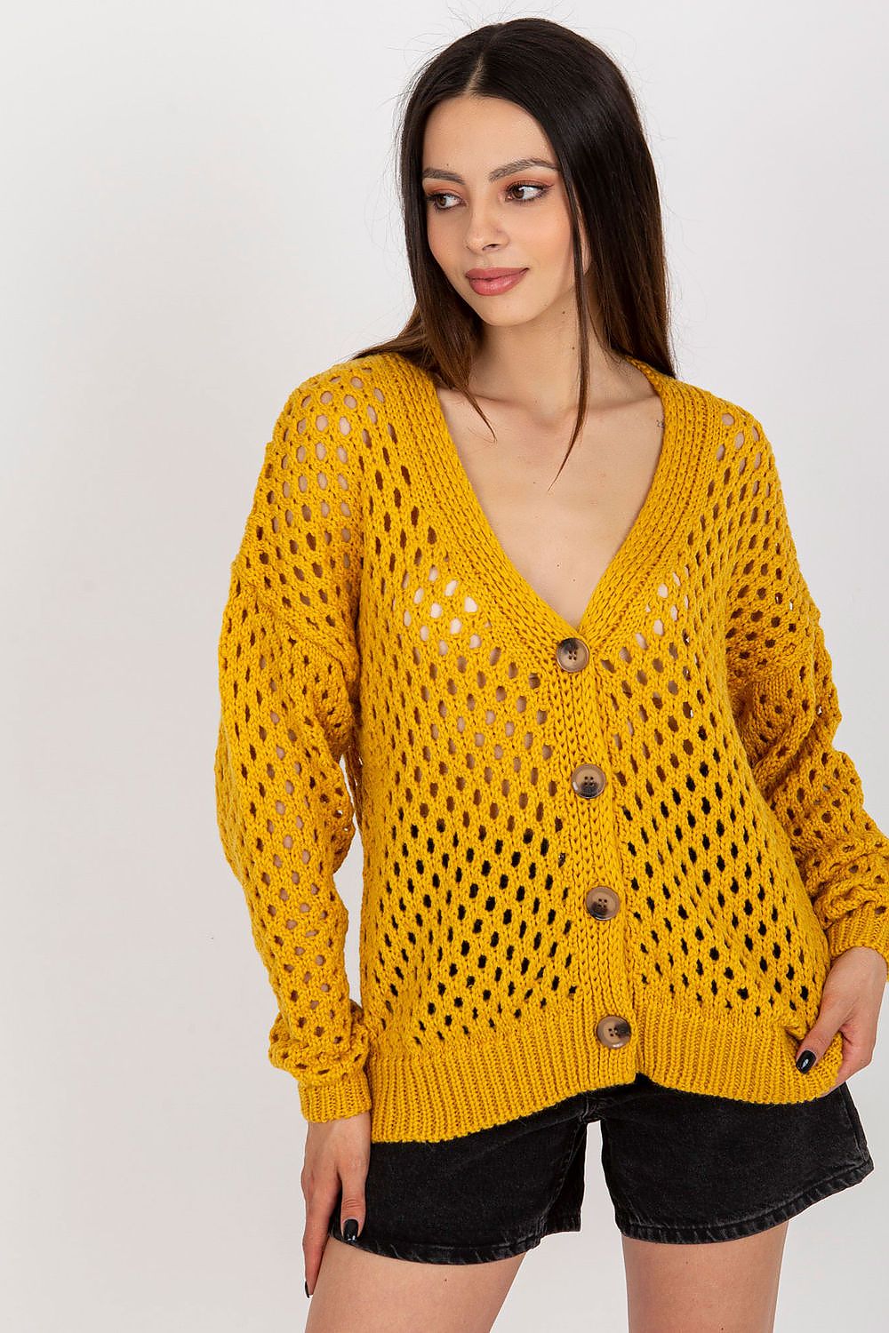 Luxurious openwork long-sleeved cardigan for women by Badu in soft acrylic and wool blend, showcasing elegant button closure.
