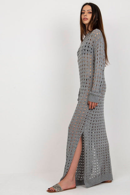 Close-up of Badu Openwork Long Knit Beach Dress fabric revealing intricate knit texture, perfect for chic beach outings.