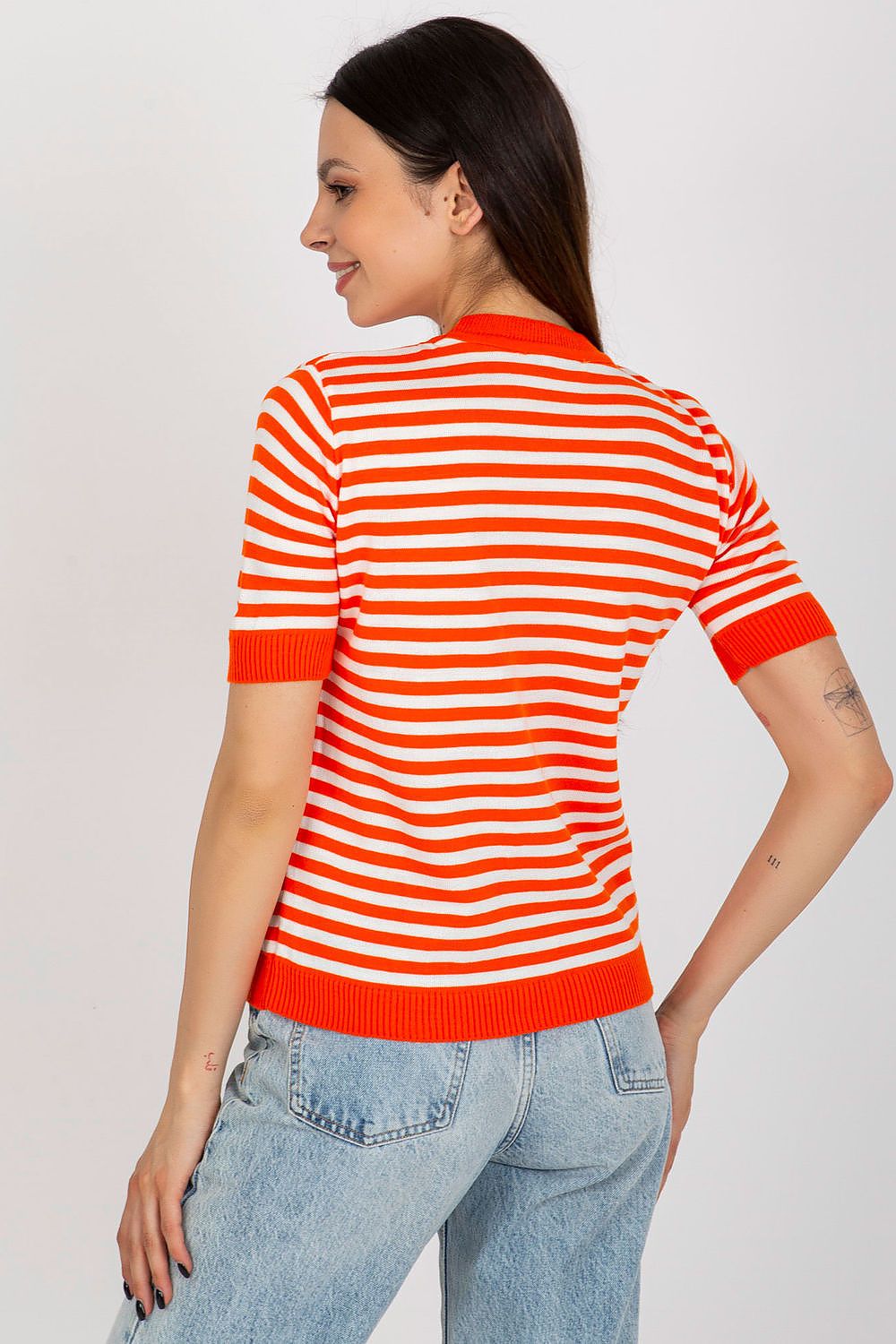 Sophisticated flat lay of the Badu colourful striped knitted blouse displaying its exquisite design.