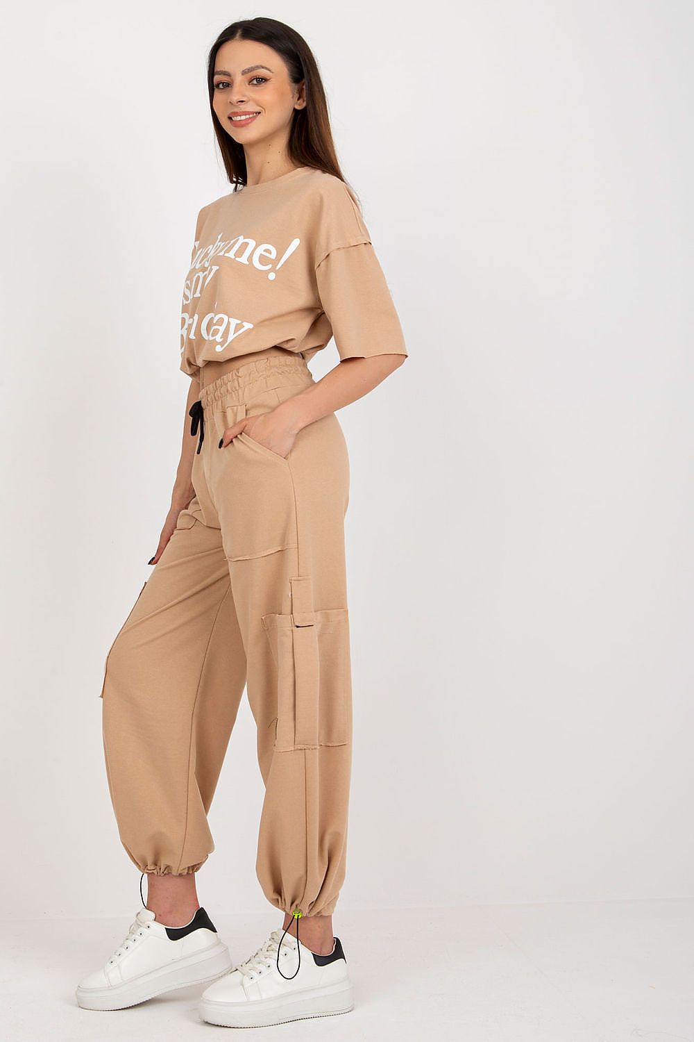 Elegant Badu 100% Cotton Tracksuit Set featuring a stylish short sleeve blouse and long trousers with a tie waist, perfect for luxurious comfort.