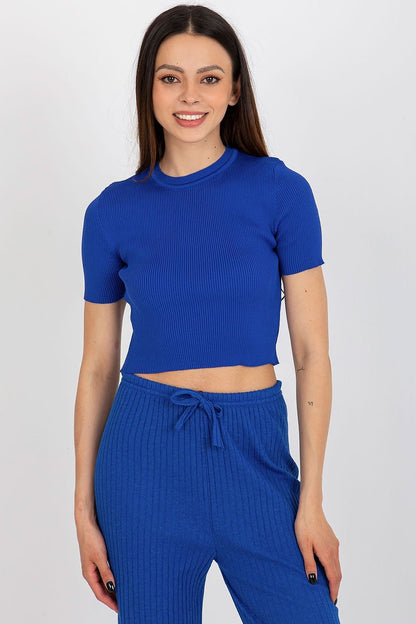 Luxurious close-up of Badu women's ribbed blouse, showcasing the high-quality 100% polyester fabric and stylish design.