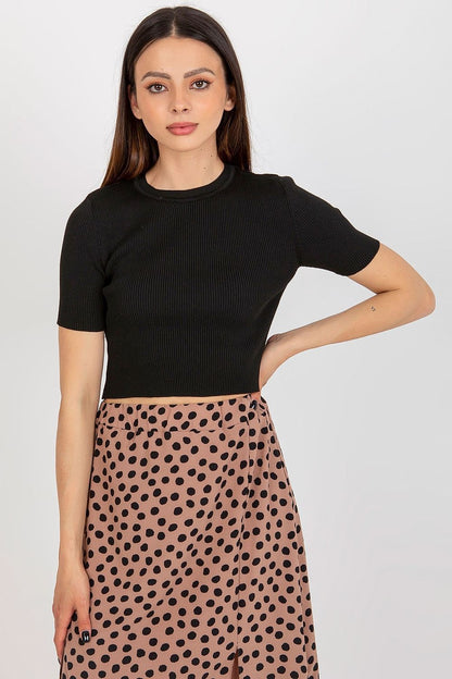 Fashionable Badu short ribbed blouse displayed elegantly, highlighting its contemporary design and premium polyester composition.