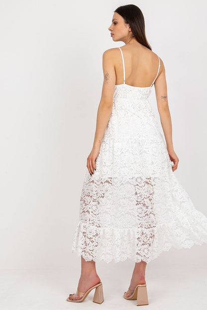 Close-up view of the lace fabric and frill detail of the adjustable strap daydress by Och Bella.