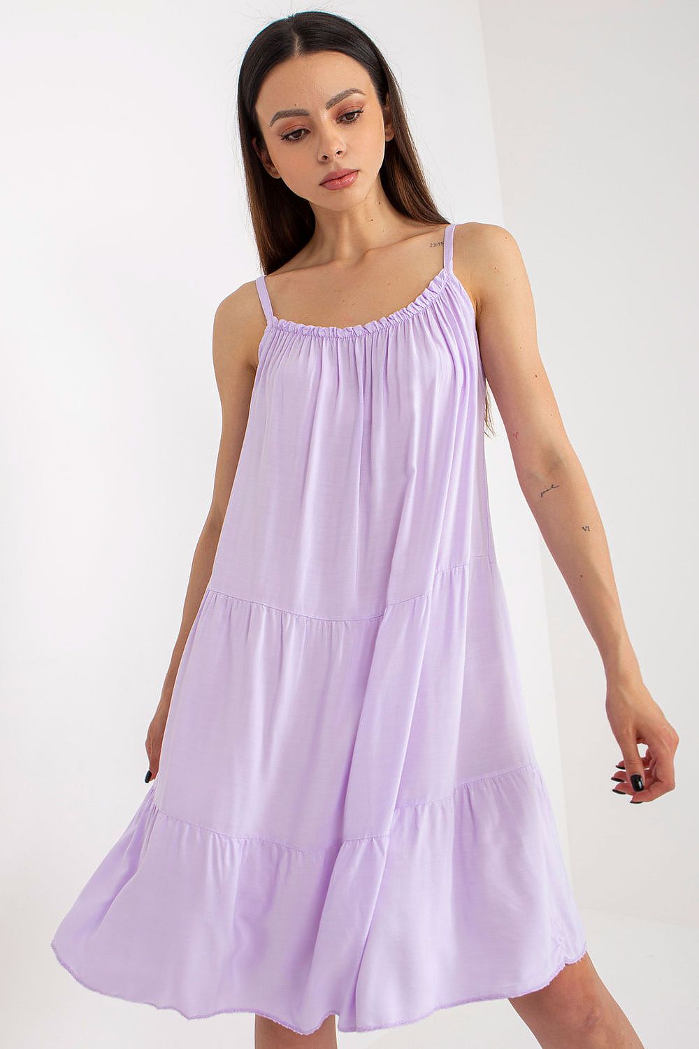 Elegant Och Bella flared cut daydress with thin straps, perfect for summer outings, showcasing luxurious design and style.