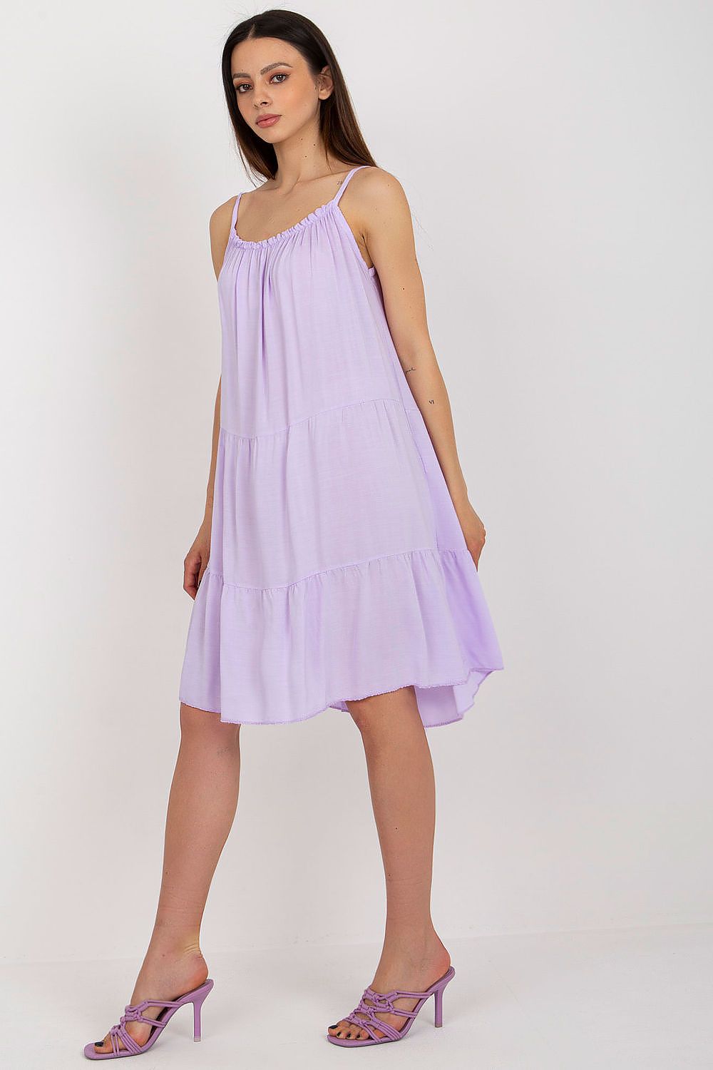 Chic summer outfit featuring the Och Bella flared cut daydress, showcasing its elegant design.