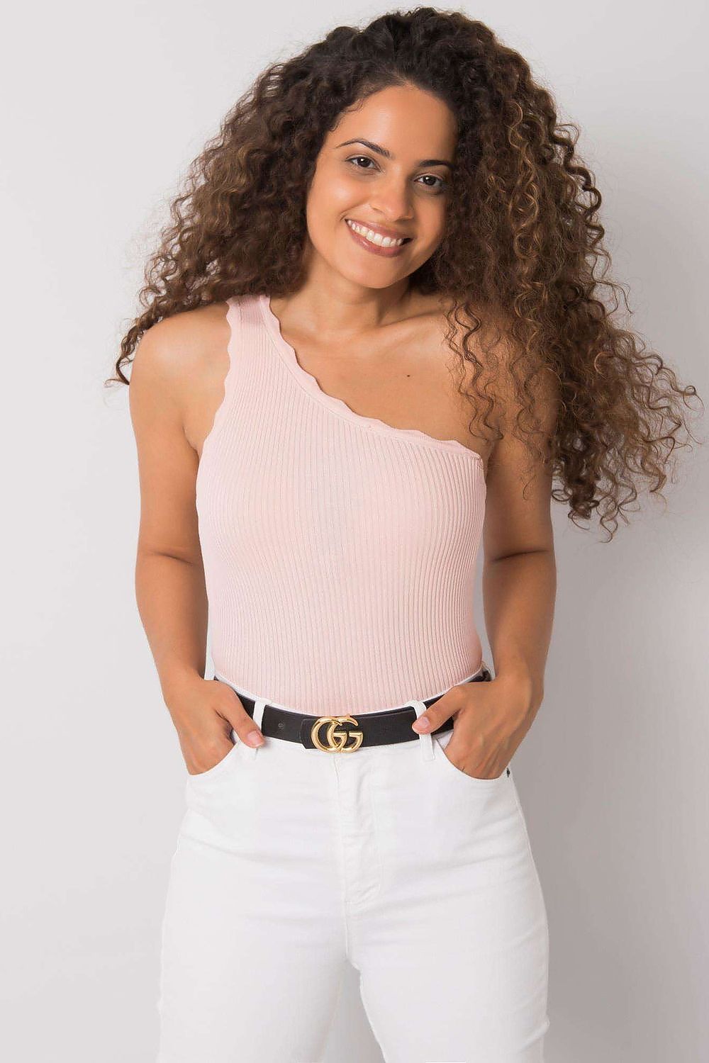 Close-up view of Calben's fashionable one shoulder ribbed top, highlighting its soft acrylic fabric and beautiful fit.